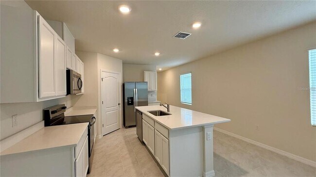 Foto del edificio - 3314 Pine Lily Ave