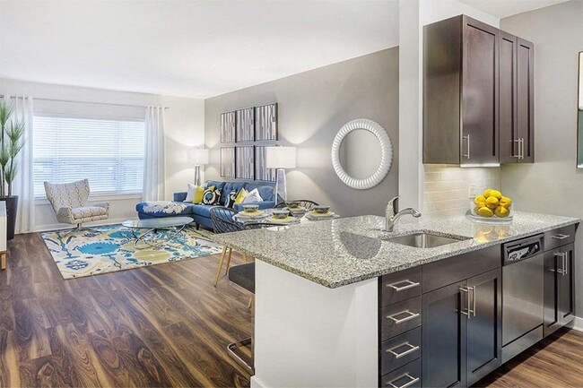 Expansive layouts with 9' ceilings and luxury vinyl plank flooring - Malden Square Apartments