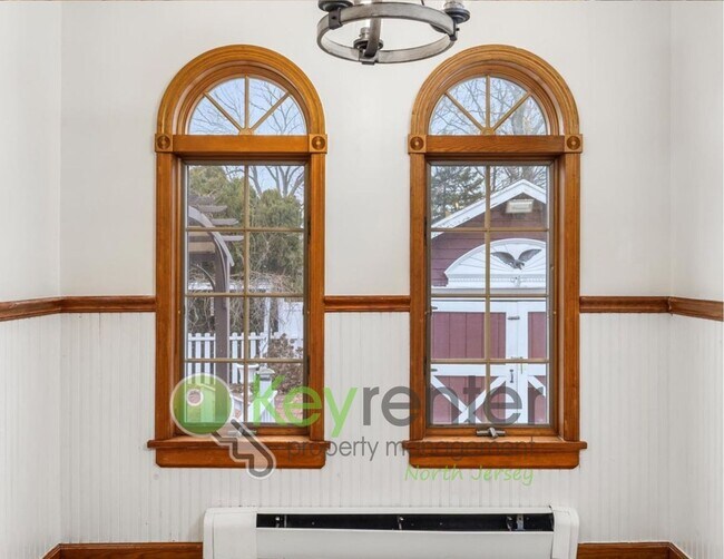 Building Photo - Spacious 3-Bed, 2-Bath Nutley Home with Bonus Office, Multi-Level Deck & Quiet Location