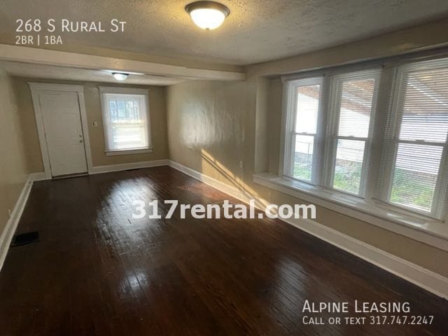 Building Photo - Near East 2BR House w/Fenced Backyard!