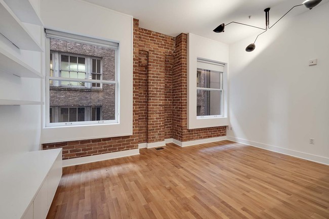 Building Photo - Fantastic Urban Condo with Exposed Brick