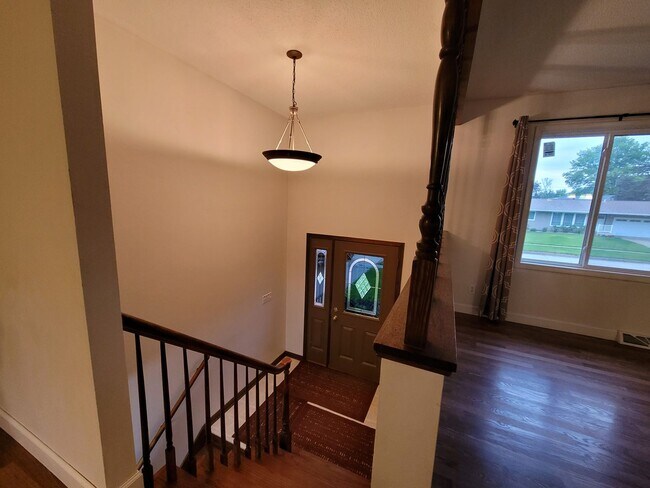 Building Photo - Coralville 4 bedroom 2.5 bath, 2 stall attached garage, fenced yard!