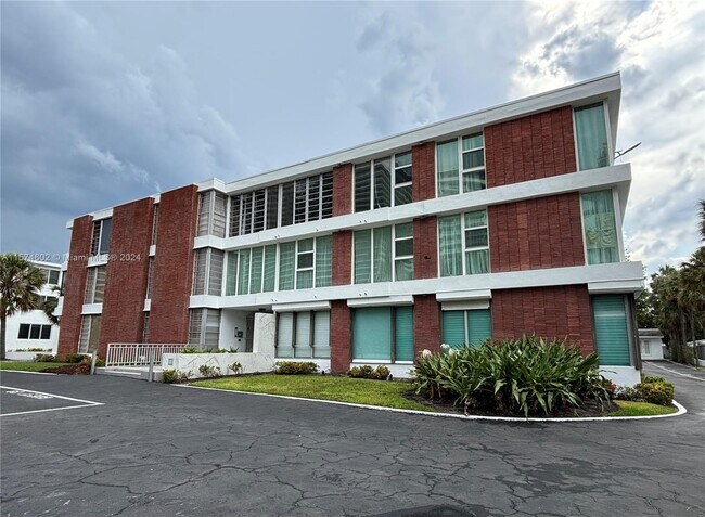 Building Photo - 10210 Collins Ave