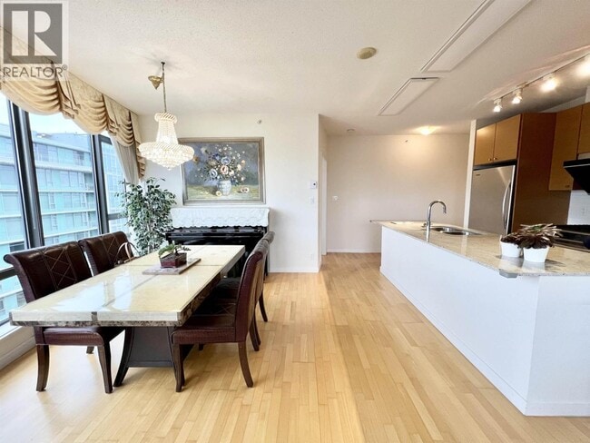 Photo du bâtiment - 6888 Alderbridge Wy