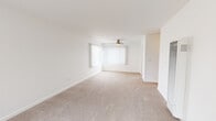 Located at 161 Crestwood Dr in Daly City, CA, this single-floor, one-bedroom, one-bathroom unit offers a clean and functional layout. The living area is generously sized, featuring neutral-toned wall-to-wall carpeting that creates a warm and comfortable atmosphere. Large windows dressed with vertical blinds allow an abundance of natural light to fill the space, while a ceiling fan provides efficient air circulation. A wall-mounted heating unit ensures year-round comfort. The entry door is accompanied by an additional window, further brightening the interior. The kitchen is a functional highlight, featuring crisp white shaker-style cabinetry that provides ample storage, complemented by light wood flooring that adds a touch of warmth. Stainless steel appliances, including a gas range and a full-size refrigerator, elevate the kitchen's practicality, while a single-basin sink with a modern faucet and a window above the counter add to its appeal. The overall design of the unit is clean and bright, with white walls throughout creating a neutral canvas that suits a variety of interior styles. This well-maintained unit offers a straightforward and comfortable living experience in a convenient Daly City location.