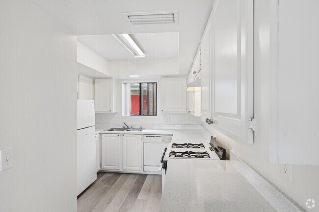 2 habitaciones, 2.5 baños - 1400 pies cuadrados - Cocina - Townhome Villas