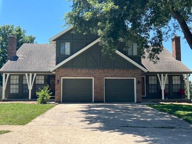 Front of duplex (unit is on the right, tree has been removed) - 14103 W 88th Terrace