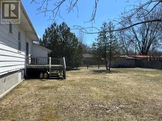 Photo du bâtiment - 824 Paradise Dr