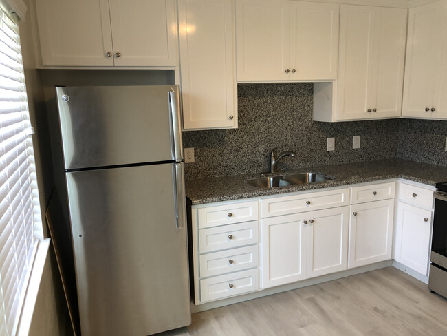 New cabs and granite counters. - 1776 Monroe St