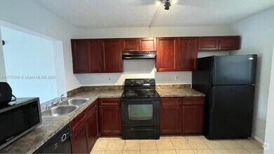 Building Photo - 9044 NW 28th Dr