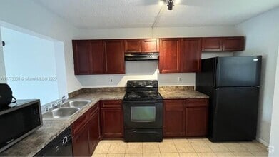 Building Photo - 9044 NW 28th Dr