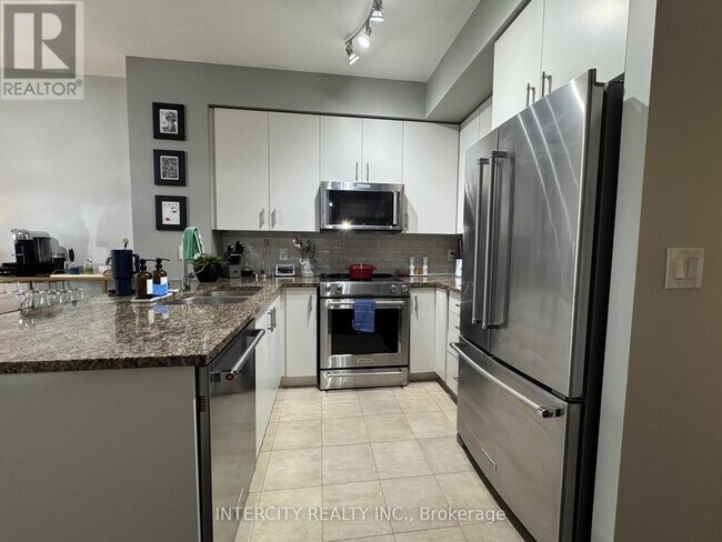 Photo du bâtiment - 438-438 King St W