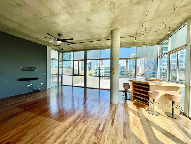 Building Photo - Stunning Corner Loft in East Village with Floor-to-Ceiling Windows & City Views!
