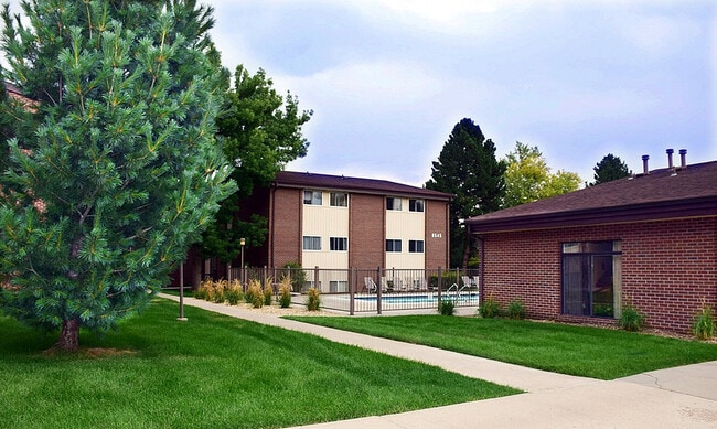 Experience peaceful living at this charming apartment complex. - PINETREE Apts