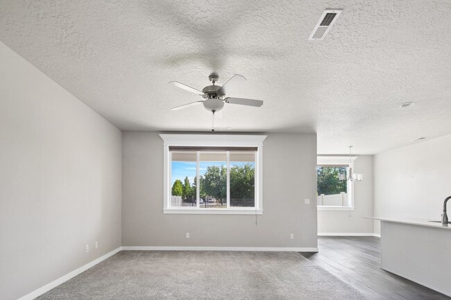Building Photo - Discover this charming 4-bedroom, 2.5-bath...