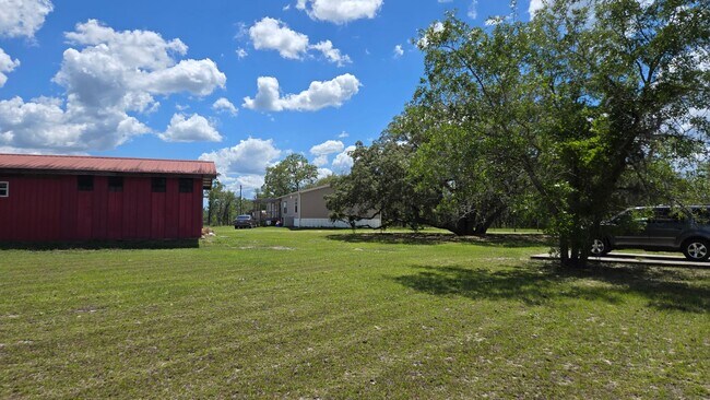 Building Photo - 4BR/3BA home on 3.5 acres of open land wit...