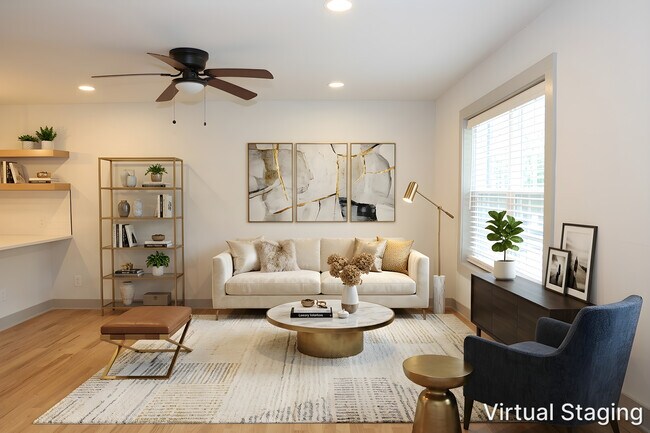 Sala de estar bien iluminada con iluminación empotrada. - 3170 Alston Townhomes.