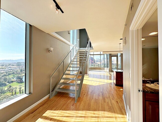 Building Photo - High Rise Metropolis 2 bedroom Condo with ...