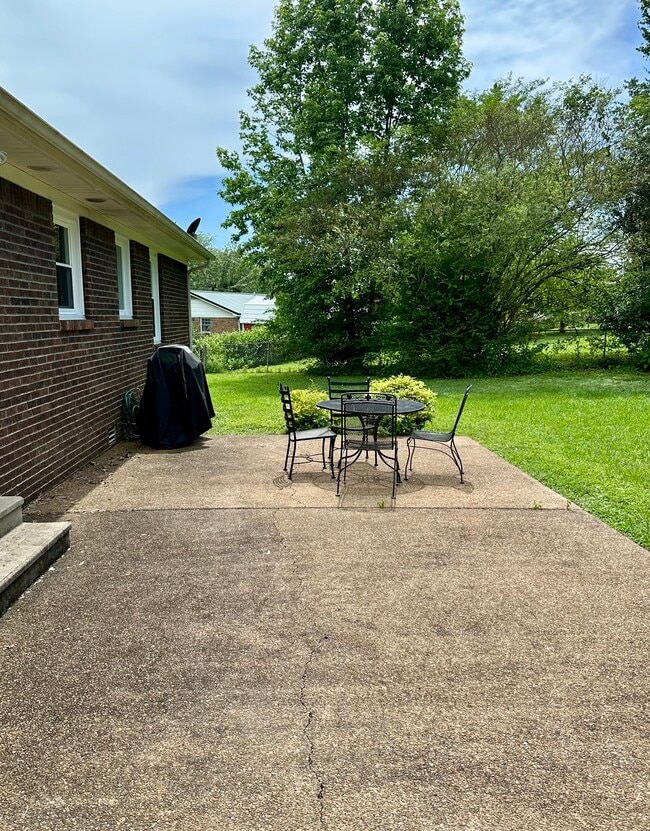 Decorative Concrete patio in the back. - 9 Garden Ln