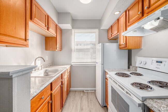 3 habitaciones, 1 baño, 916 pies cuadrados, cocina - Sunset Townhouses