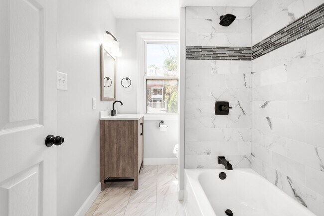 Building Photo - FULLY RENOVATED 4 BEDROOM BEAUTY IN MOUNT ...