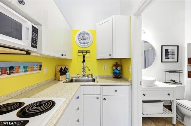 Building Photo - 25000 Tamiami Trl E