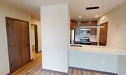 This contemporary 580 square foot apartment, located at 531 W Washington Ave in Madison, Wisconsin, offers a perfect blend of modern living and urban convenience. The space is efficiently designed with one bedroom, measuring 140 square feet, and an open-concept living area that combines the kitchen and living room.

The apartment showcases sleek, modern finishes throughout. The kitchen is a highlight, featuring stainless steel appliances, including a large refrigerator, and ample cabinet space with clean, minimalist hardware. The countertops appear to be quartz or a similar high-end material, providing both durability and style.

Light wood flooring runs throughout the apartment, creating a warm and inviting atmosphere. The walls are painted in a neutral tone, allowing for versatile decorating options. Large windows in the living area and bedroom flood the space with natural light and offer views of the surrounding cityscape, enhancing the sense of openness.

The bedroom, while compact, is well-proportioned and includes a closet for storage. The apartment also features recessed lighting, adding to the modern aesthetic and providing adjustable illumination options.

A standout feature is the balcony accessible through sliding glass doors, offering an outdoor extension of the living space - perfect for enjoying morning coffee or evening relaxation. This thoughtfully designed apartment maximizes every square foot, creating an ideal living space for urban professionals or anyone seeking a contemporary, low-maintenance lifestyle in the heart of Madison.