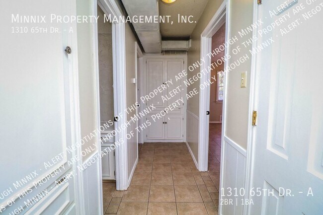 Building Photo - 1310 65th Dr. #A