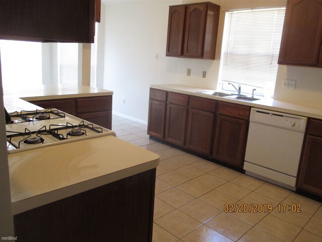 Building Photo - 4 br, 2 bath House - 8418 Rose Garden Drive