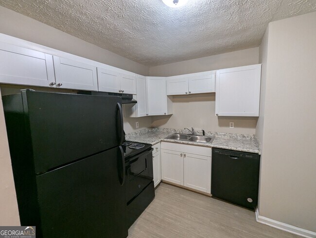 Foto del edificio - 242 Rustwood Dr