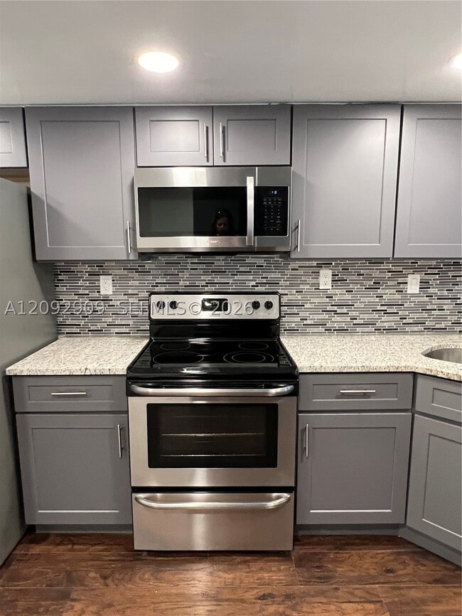 Building Photo - 6655 Racquet Club Dr