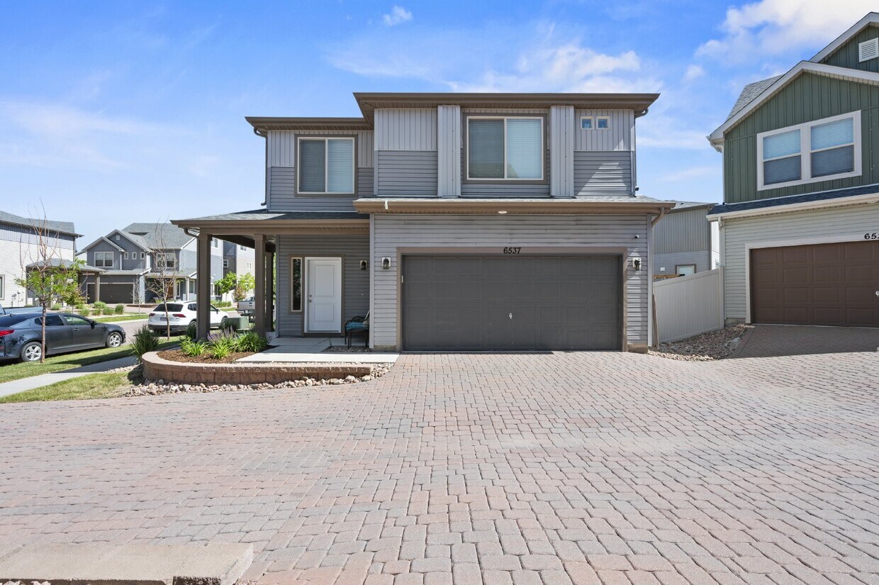 Primary Photo - "Modern Living Awaits at 6537 Shadow Star ...