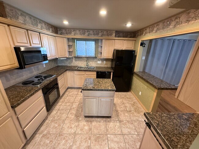 Building Photo - 8618 Baltimore Dr