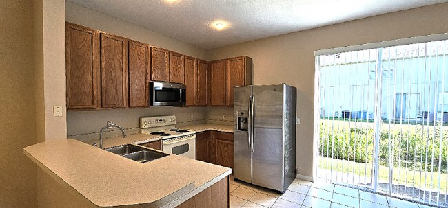 Foto del edificio - 8775 Christie Dr