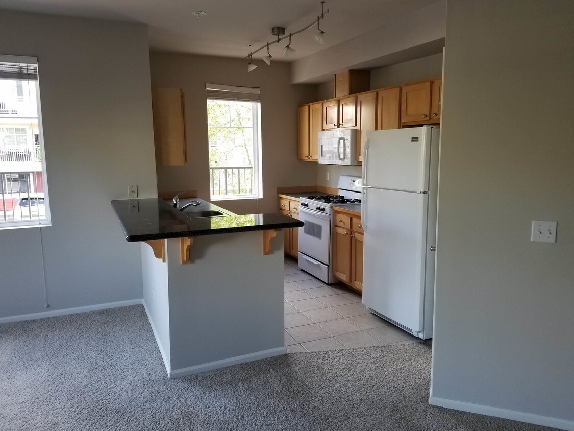 Kitchen and dining area - 517 225th Ln NE