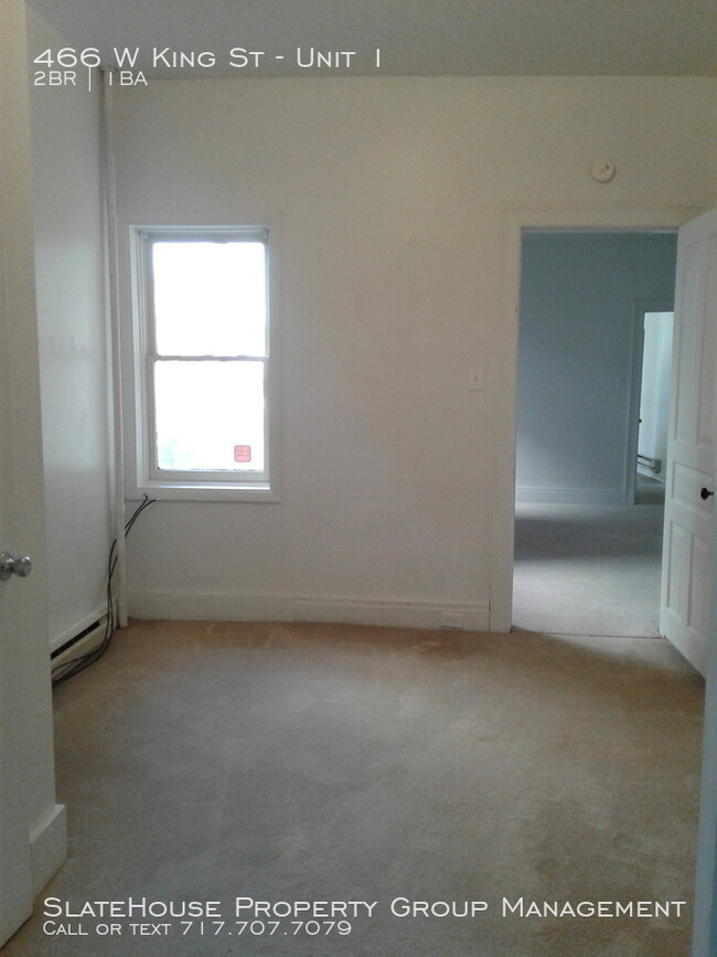 Building Photo - First floor two bedroom with yard!