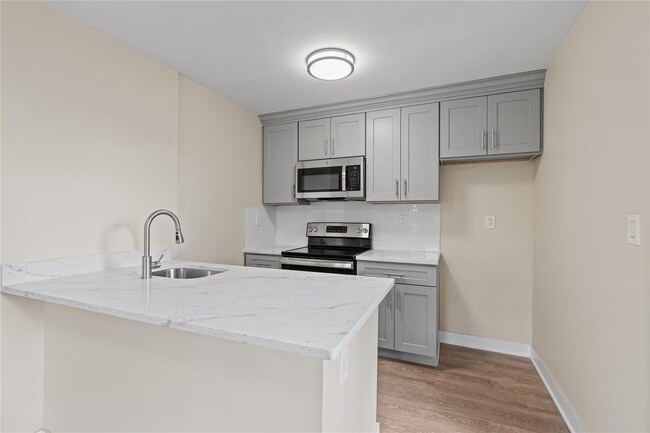 Cocina de la Unidad 401 - Wakefield Station Apartments