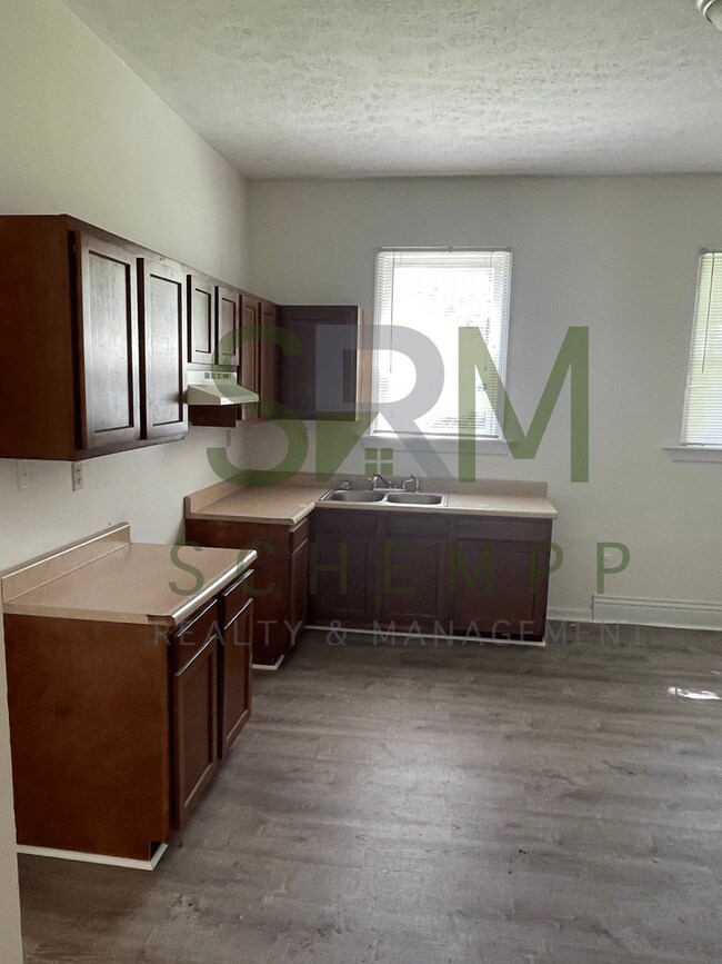 Building Photo - Updated three bedroom two bathroom home in West Louisville! *Section 8 accepted*
