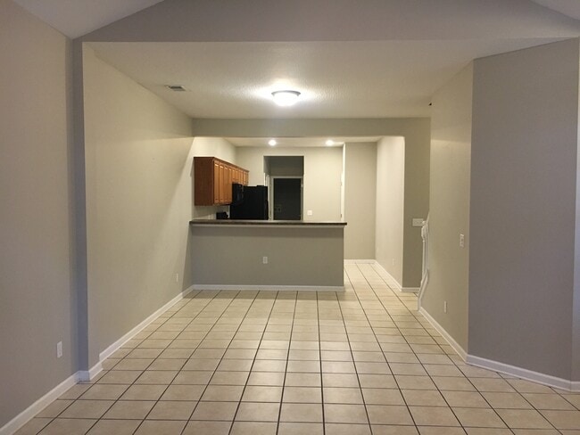 Dining area open to great room and kitchen - 2833 Riverwalk Blvd