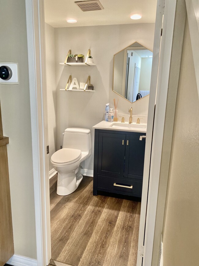 Downstairs half bath - 18838 Hatteras St