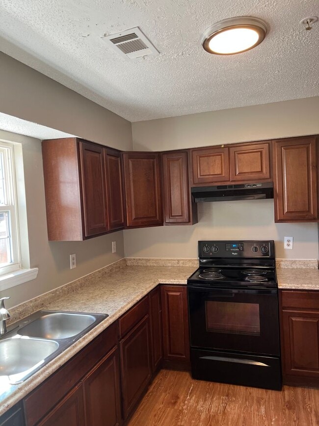 Building Photo - Modern 3BR/2.5BA Townhome – New Everything + Section 8 Accepted