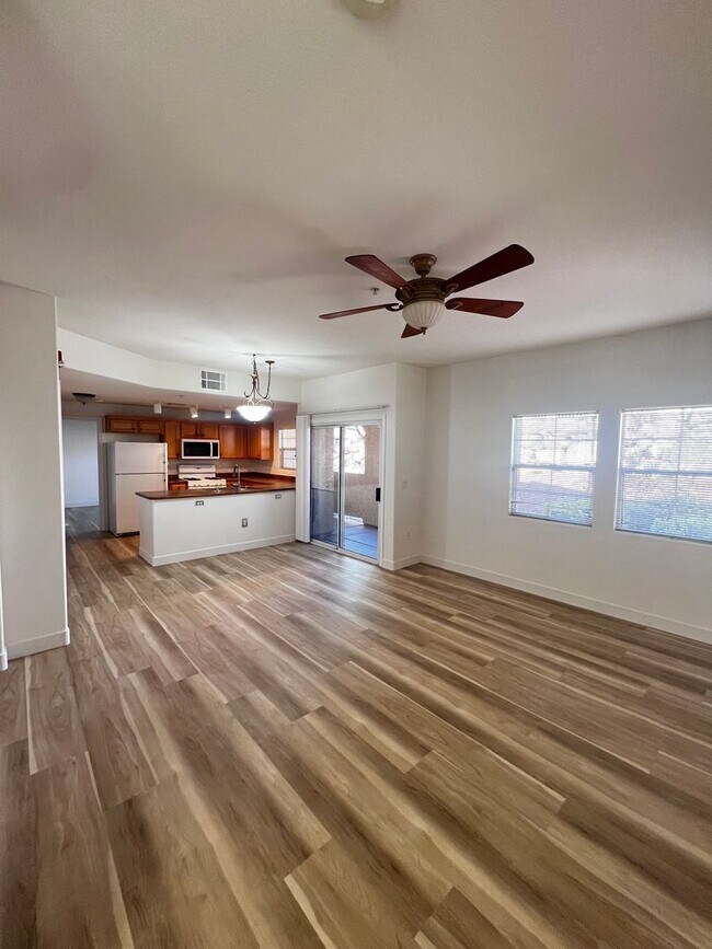 Building Photo - Gated Community / Community Pool / Luxury Vinyl Planking Throughout