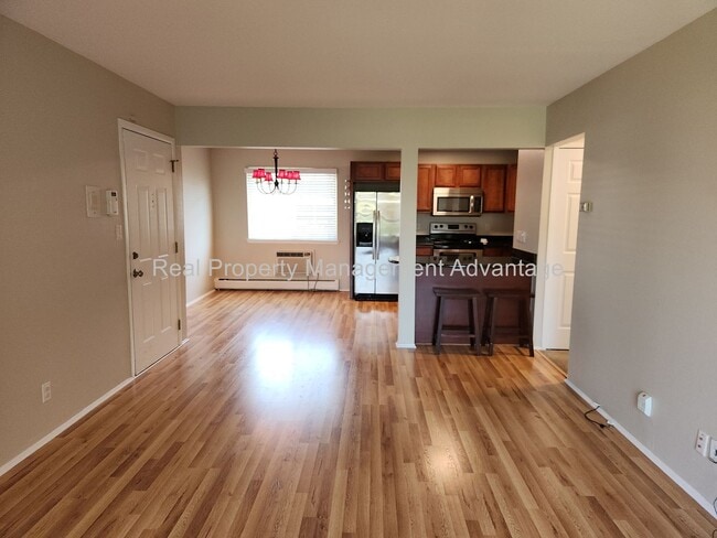 Building Photo - Spacious, Updated Condominium with Two Ful...