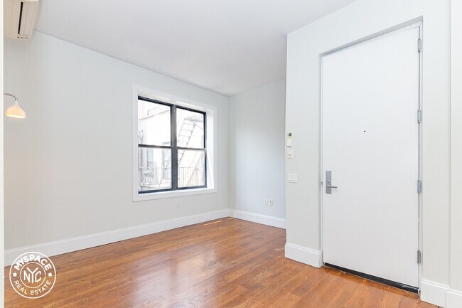 Building Photo - 16-55-55 Putnam Ave