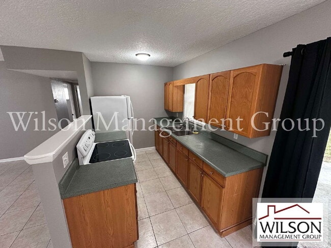 Building Photo - 900 Jamela Dr