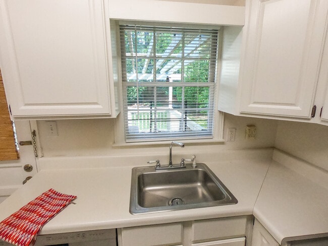 Kitchen looking to back deck. - 488 Montgomery Ferry Rd NE