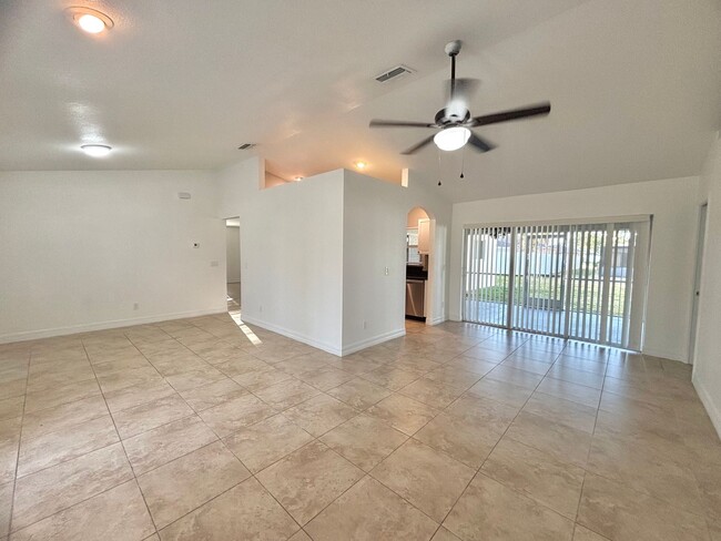 Building Photo - Spacious 4 Bedroom Home with 3 Car Garage,...