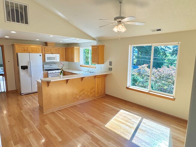 Building Photo - Montavilla Polished 2-Story with Hardwoods, Whole House A/C, Attached Garage, Off-street Parking