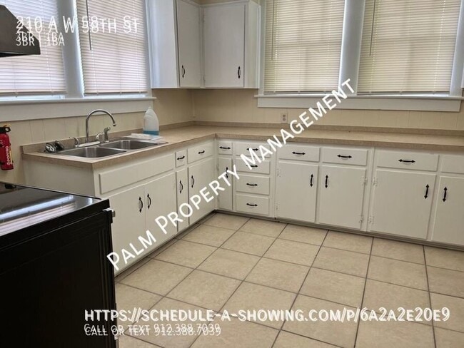 Building Photo - 210 W 58th St