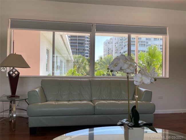 Building Photo - 10170 Collins Ave